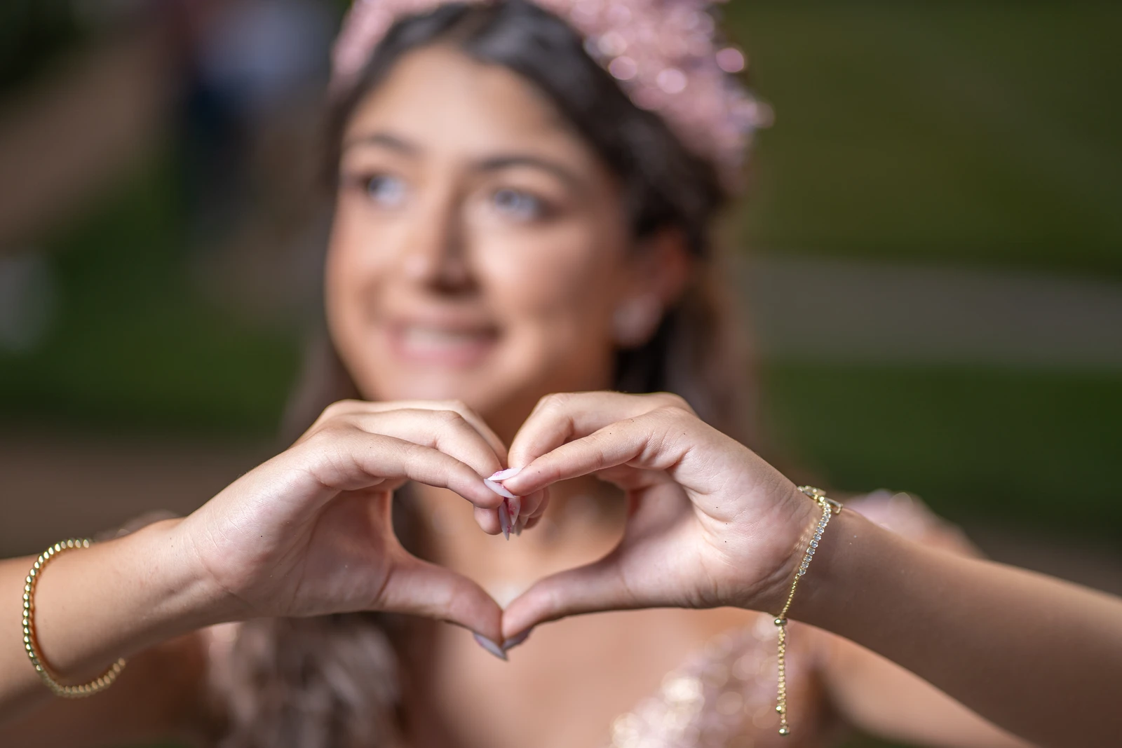 Kansas City quinceañera portrait of girl in purple dress holding bouquet outdoors